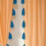 Homyra Decor Peach Sheer Curtains with Turquoise Tassels & Layered Hem – Boho Window Drapes for Living Room & Bedroom